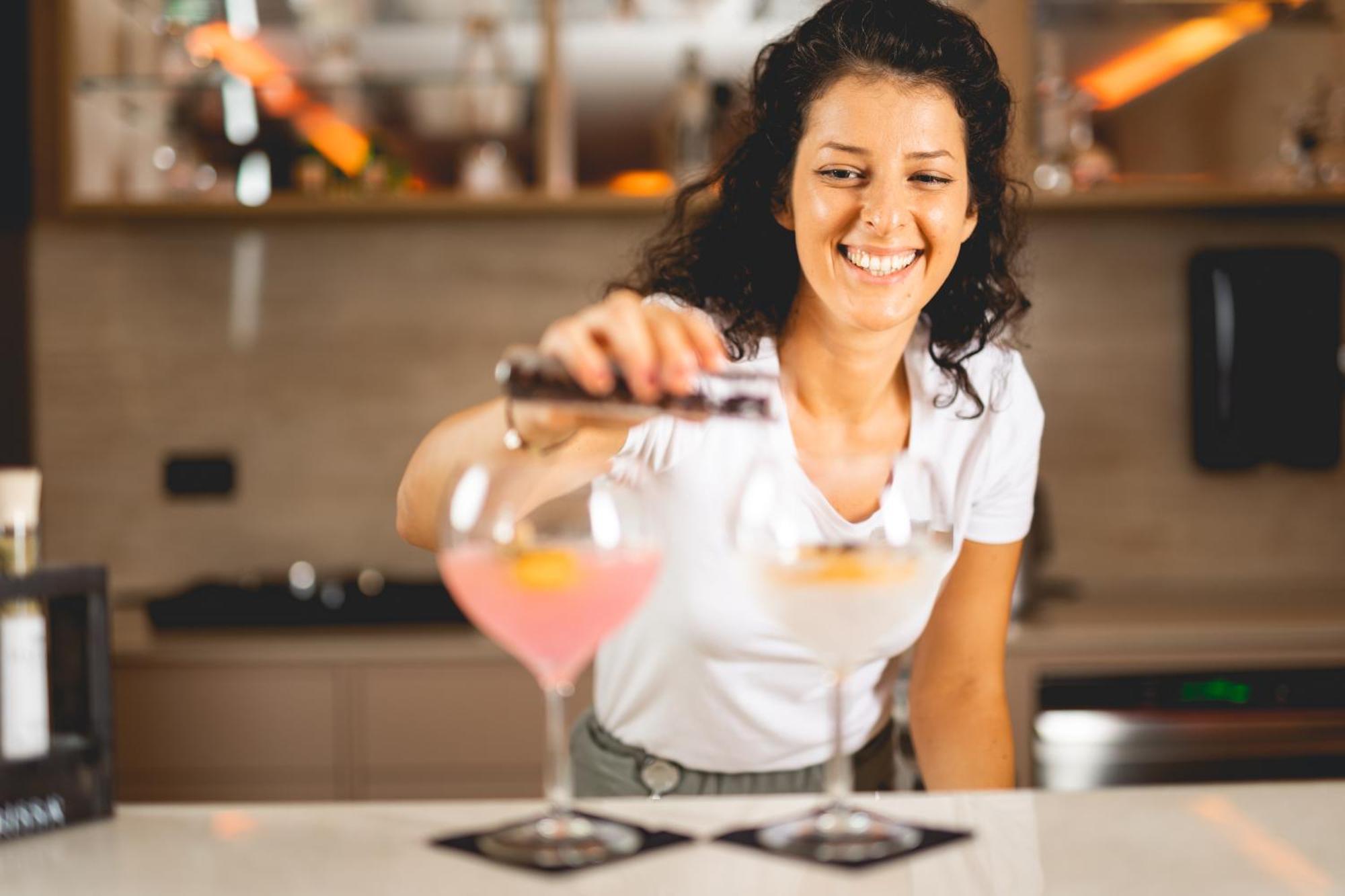 Hilton Rijeka Costabella Beach Resort And Spa Exteriör bild A bartender at work