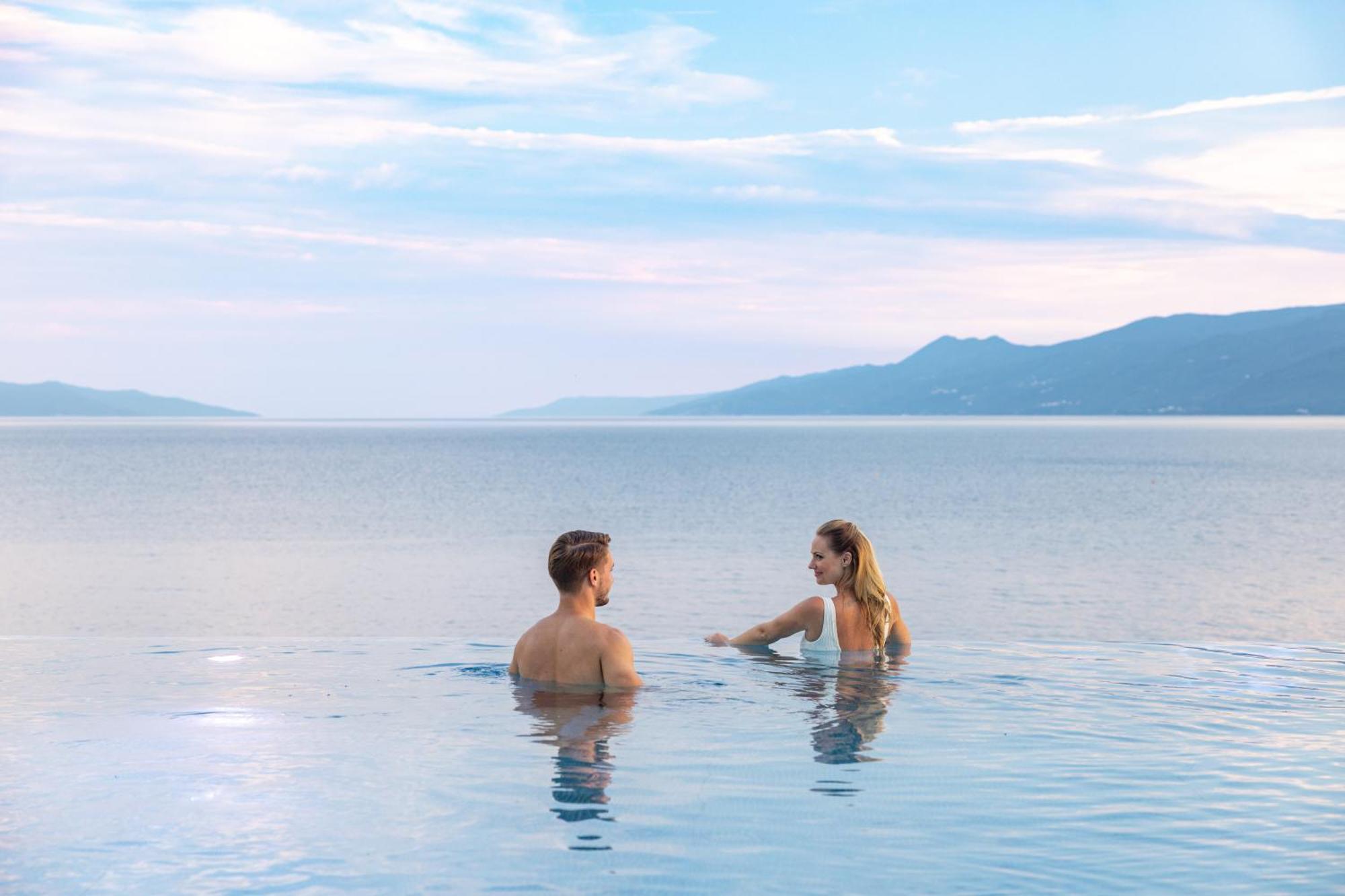 Hilton Rijeka Costabella Beach Resort And Spa Exteriör bild Bathing in the Dead Sea